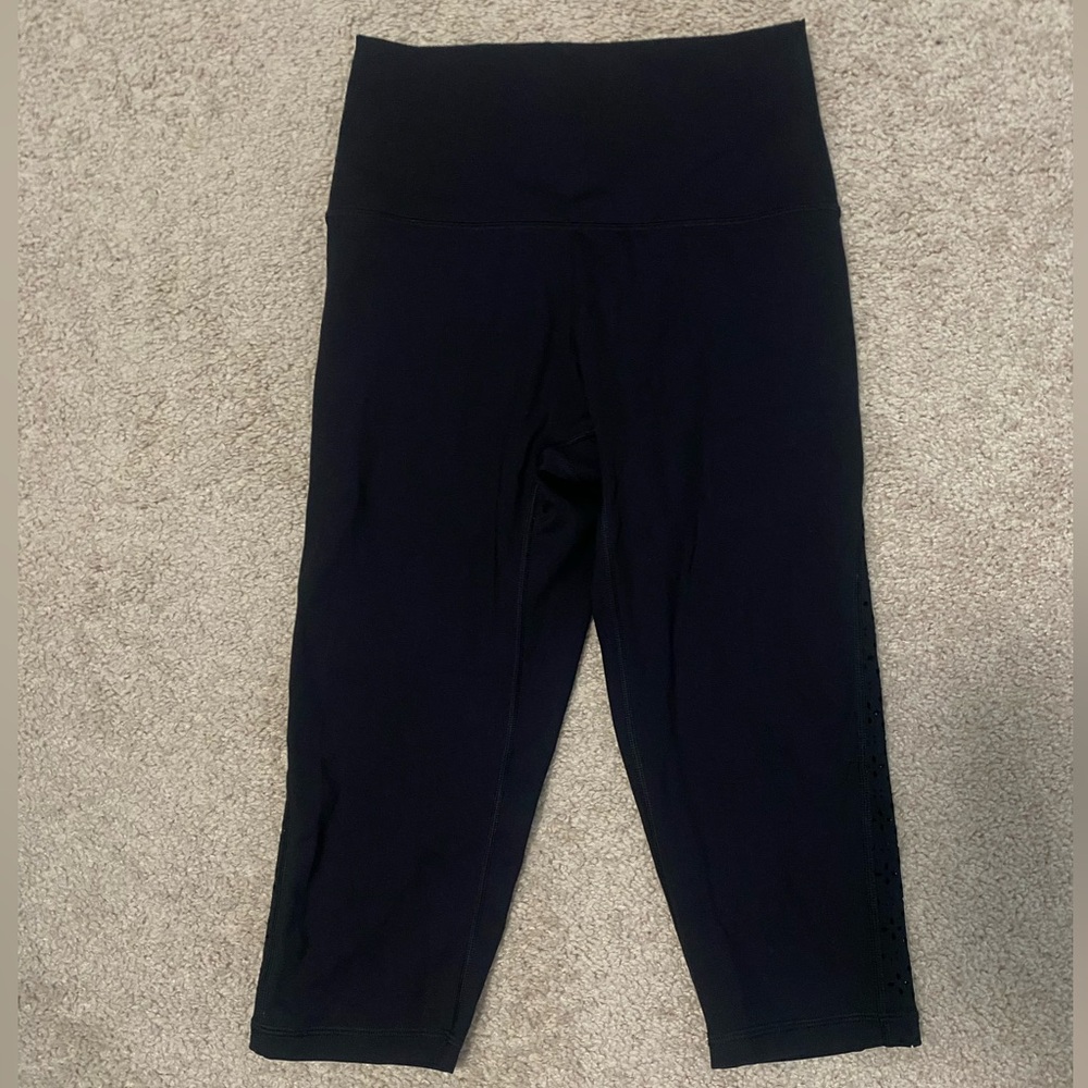 Aerie chill play move cropped black leggings with floral laser cutouts on sides